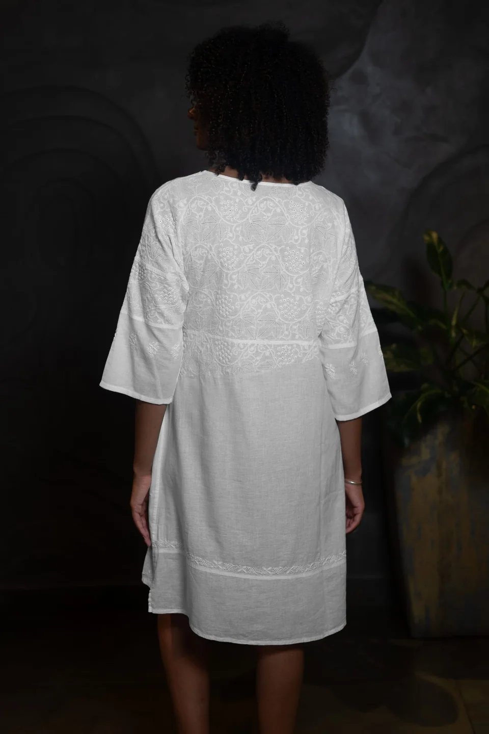 Back of the white chikankari tunic, embroidery across the yoke and hem