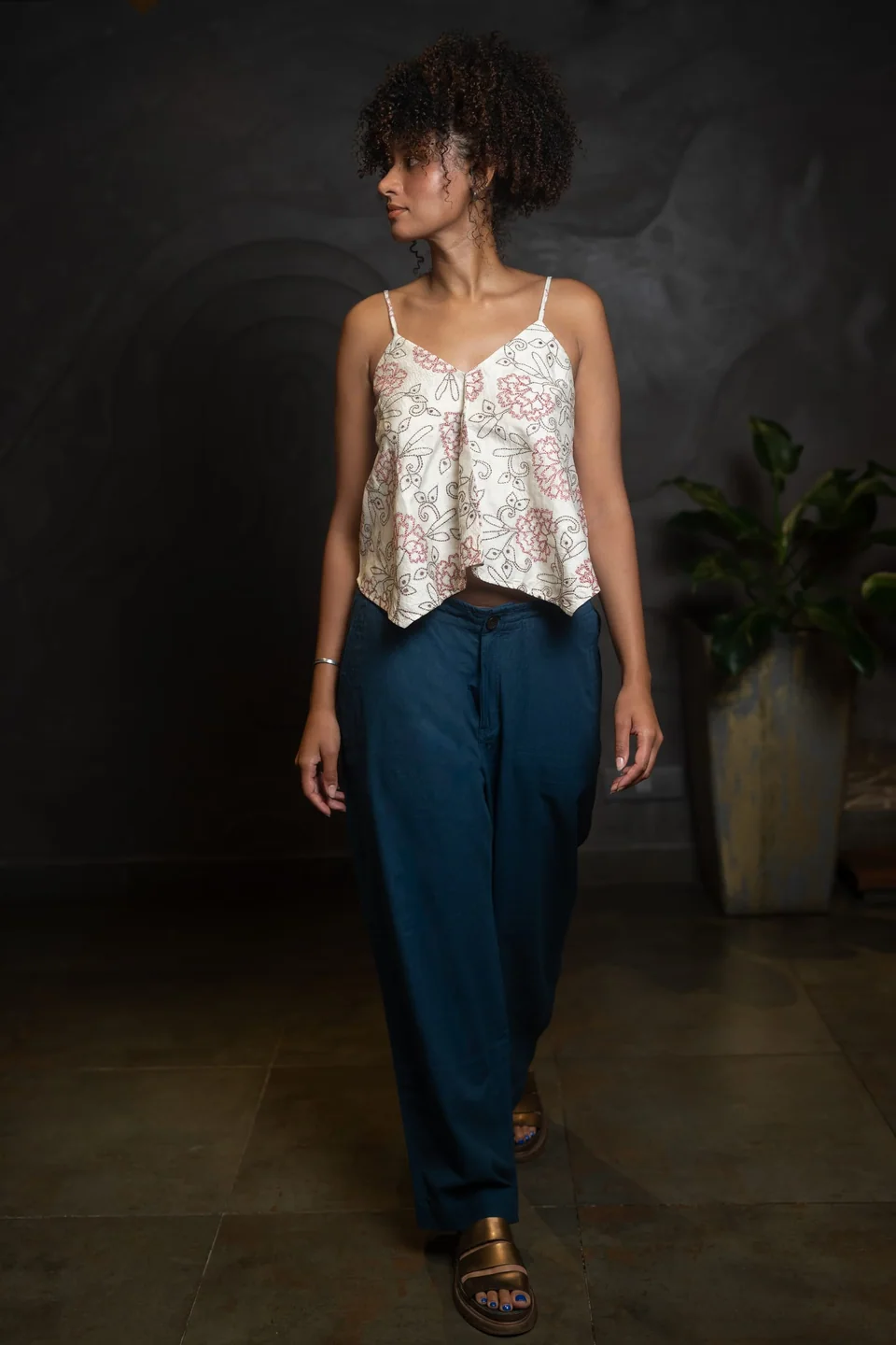 Three-quarter view of the silk kantha cami, glancing over the shoulder